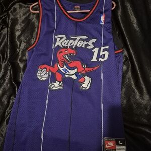Nike Purple Raptors Jersey with Red Accents